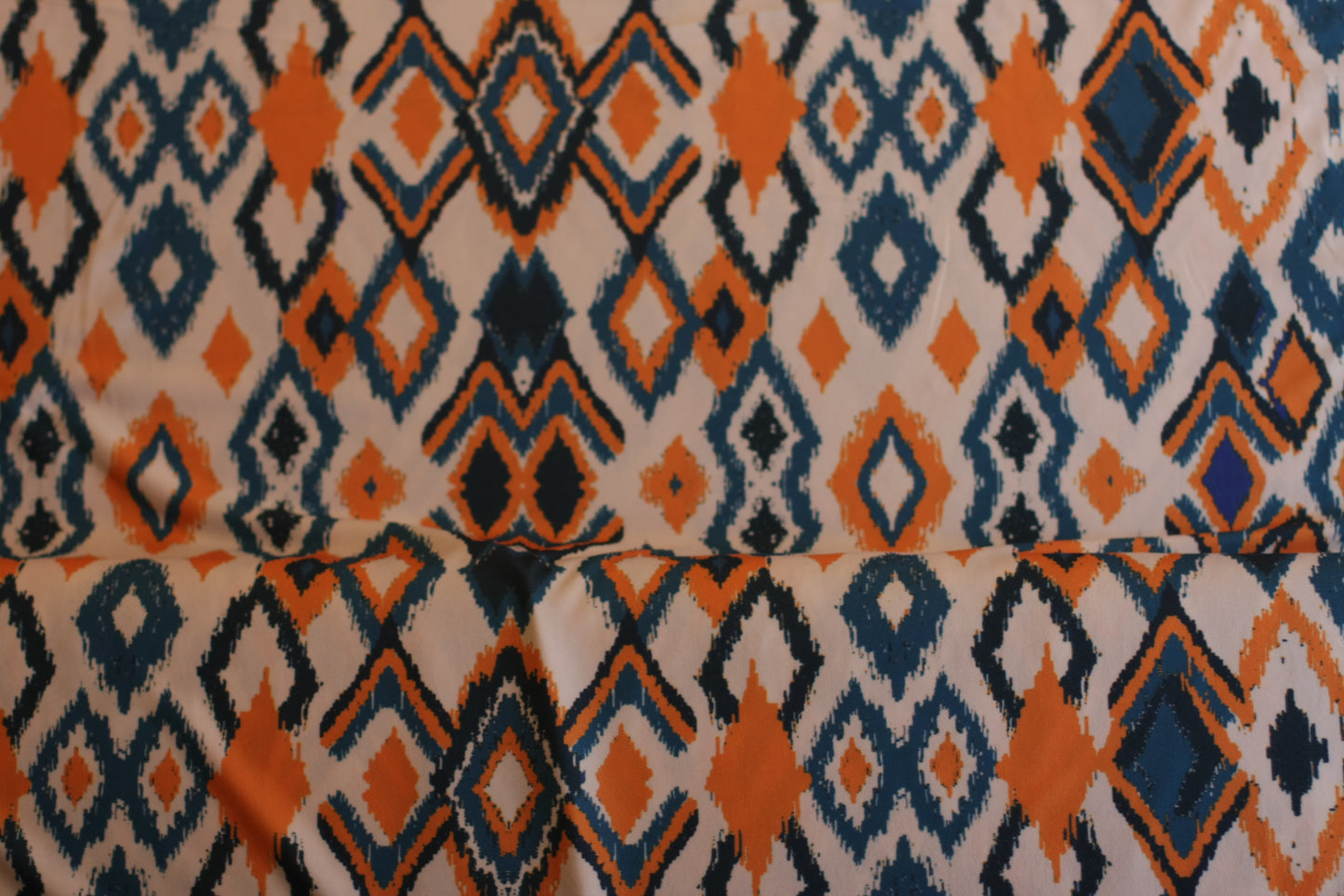 Polyester élasthanne imprimé orange bleu blanc