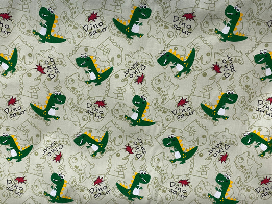 Coton imprimé dinosaures vert jaune